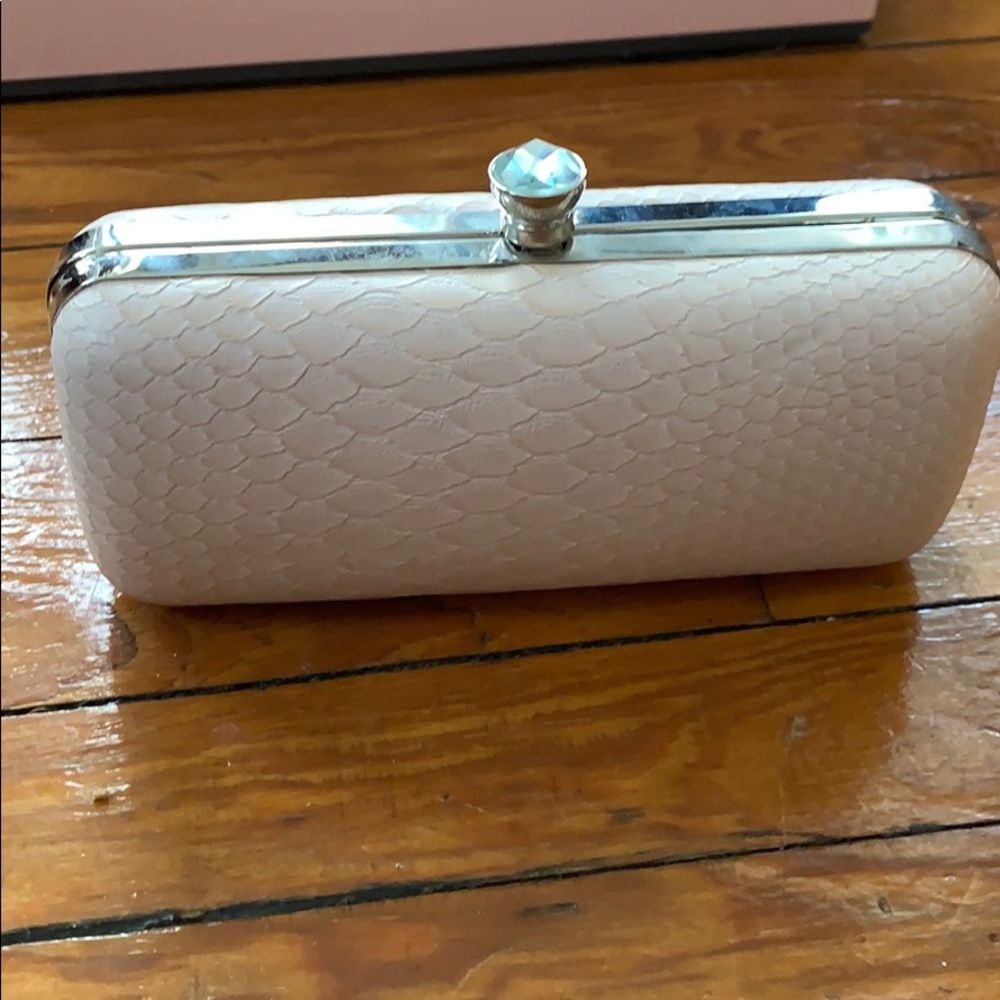 Pink clutch bag